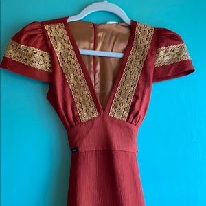 Beautiful rust and gold silk dress. Never worn.